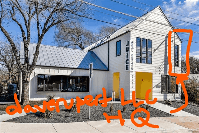 Exterior shot of white modern farmhouse building with my office window circled